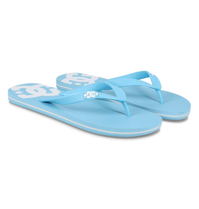 DC Shoes Men's Spray Slides feature light blue textured straps, flat soles, and white DC logos on the footbeds—ideal for relaxing after skating. Shown side by side on a white background.