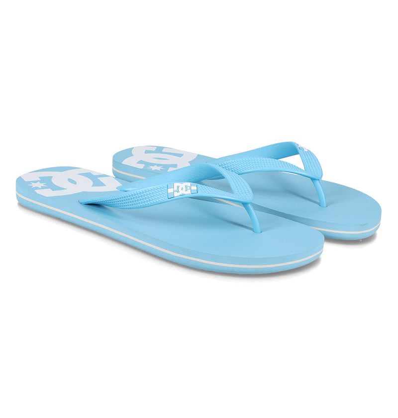 DC Shoes Men's Spray Slides feature light blue textured straps, flat soles, and white DC logos on the footbeds—ideal for relaxing after skating. Shown side by side on a white background.