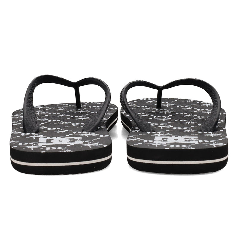 A rear view of Men's Spray Graffik Slides by DC Shoes—black slip-on flip-flops with a white geometric pattern and white side stripes.