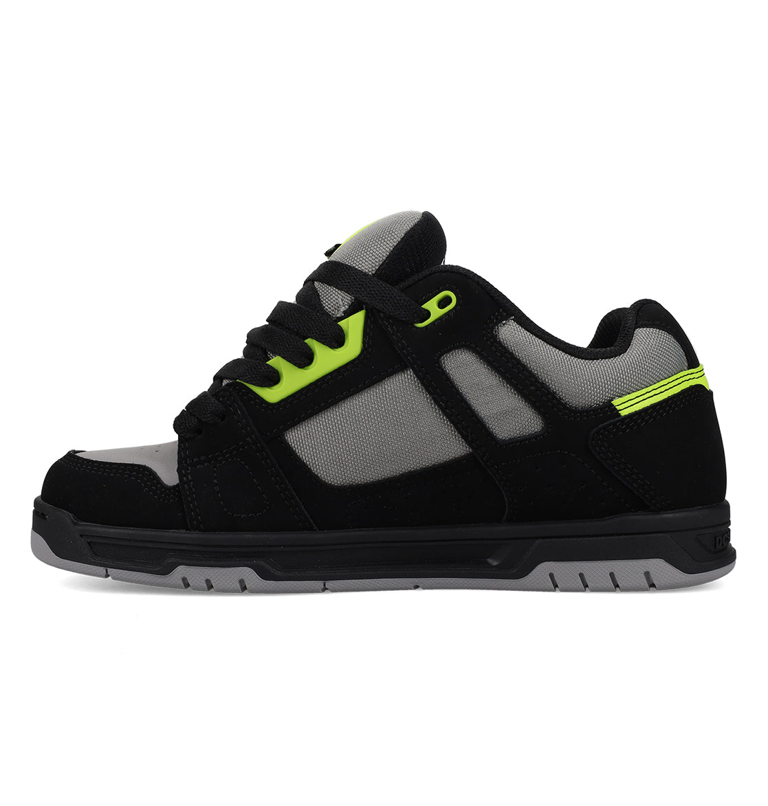 The Men's Stag Shoes by DC Shoes feature a black and gray design with neon green accents, black laces, mesh panel upper, durable cupsole, and rubber sole; displayed side profile on a white background.