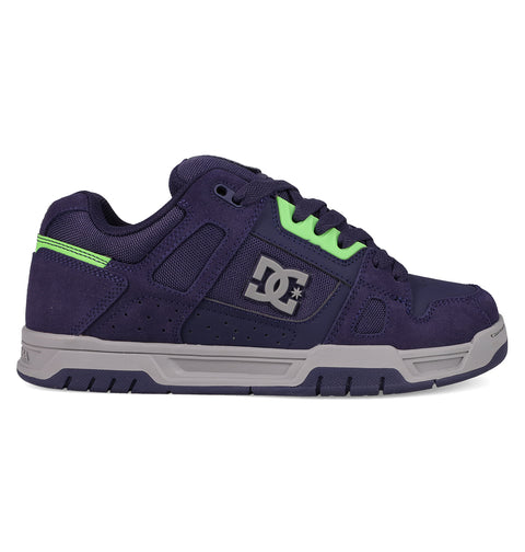 Inspired by skate culture, the DC Shoes Men's Stag Shoes are navy blue and gray with green accents, a cupsole construction, thick sole, mesh and suede panels, black laces, and feature the DC Shoes logo.