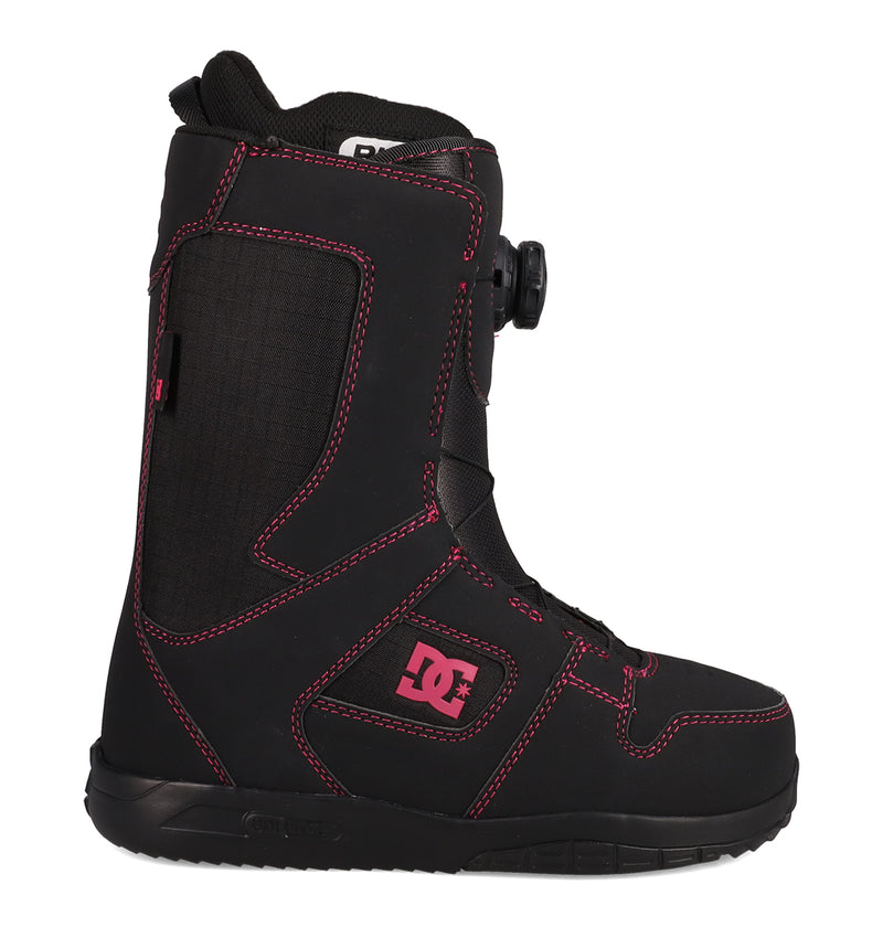 A side view of the Women's Phase BOA® Snowboard Boots by DC Shoes is displayed against a white background, showing the black boot accented with pink stitching and a pink DC Shoes logo, and featuring the advanced BOA® Fit System for easy tightening.