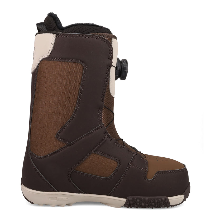 The DC Shoes Women's Phase BOA® Pro Snowboard Boots, shown in profile facing left against a white background, feature brown and tan uppers with PrimaLoft insulation, a black sole, and a twist dial BOA® lacing system.