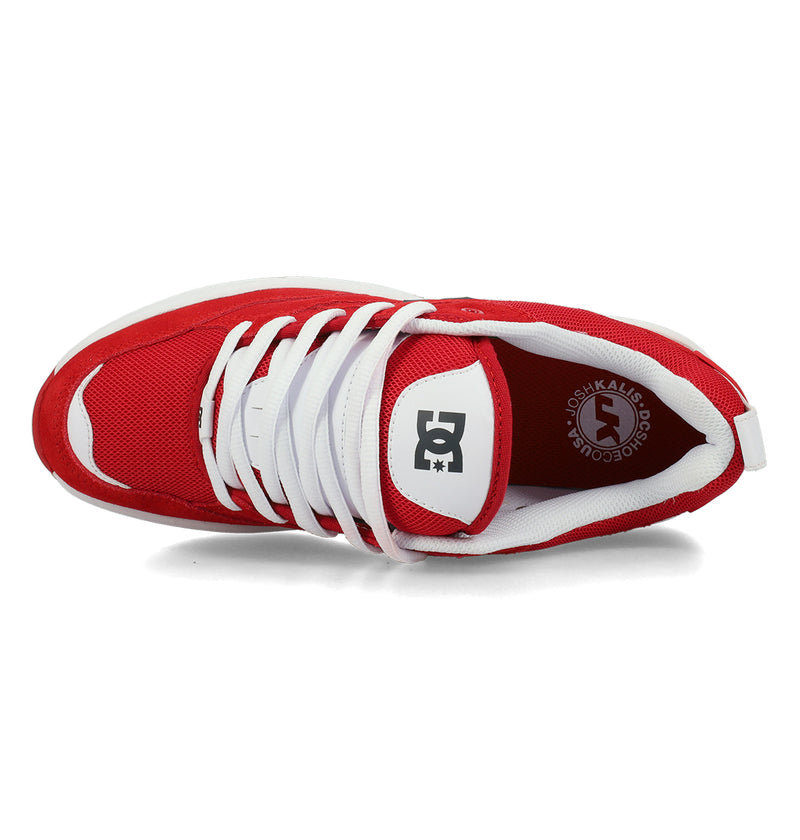 The DC Shoes Men's Ascend Skate Shoes, shown from above, feature a red and white design with a white tongue, white laces, inner lining, and the DC logo—combining classic style with modern comfort inspired by Josh Kalis.