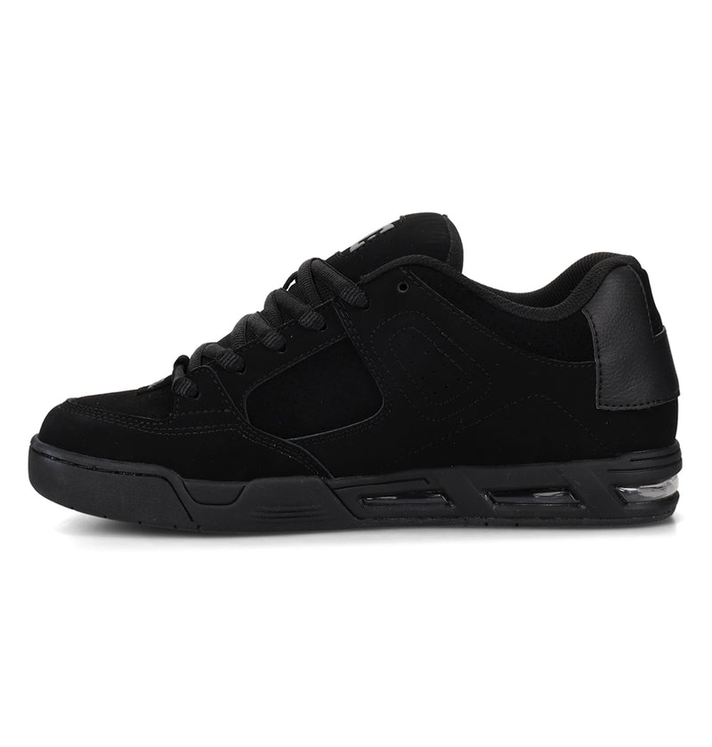 Black low-top DC Shoes Men’s Command Shoes with a thick sole featuring clear air cushioning units and a street-ready design.