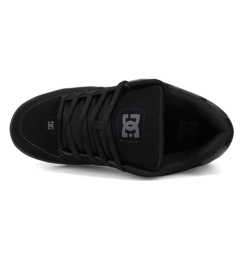Top-down view of a black Men’s Command Shoes skate shoe with matching laces and a logo on the tongue and toe, highlighting its street-ready design.