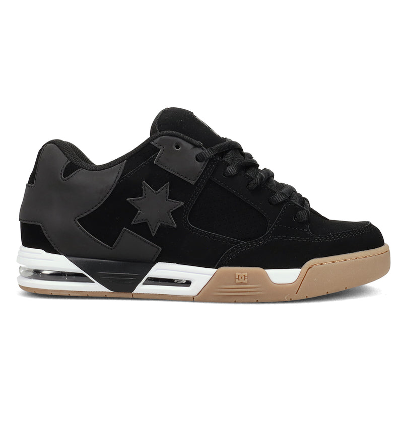 The Men's Command Shoes by DC Shoes feature a black and dark gray low-top design with black laces, a star logo on the side, signature heel cushioning, and a gum rubber sole inspired by the classic DC bulk style.