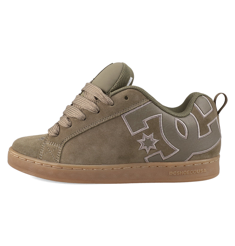 The Women's Court Graffik SD Shoes by DC Shoes feature brown suede, a puffy silhouette, tan laces, a gum rubber sole, and a large outlined DC logo on the side.