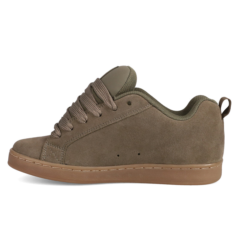 The DC Shoes Women's Court Graffik SD features brown suede, matching laces, a padded tongue and collar, subtle stitching, and a tan rubber sole. Shown from the side on a white background.