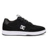 The DC Shoes Men’s Astrix Shoes are black skate shoes featuring a white logo and accents, flat black laces, and a white rubber sole. Shown in side profile against a plain white background, these shoes are crafted for street skateboarding and engineered to provide optimal board control.
