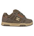 The DC Shoes Men's Stag Shoes feature a brown and tan design, chunky cupsole, perforated details, lace-up front, smooth and textured panels, and the iconic DC logo—ideal for authentic skate style.