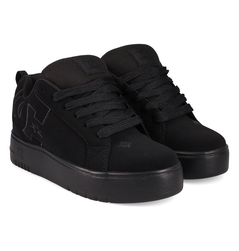 The Women's Court Graffik Platform Shoes by DC Shoes feature thick soles, black laces, and DC logos on the side and tongue. They are designed for women and shown in black on a white background.