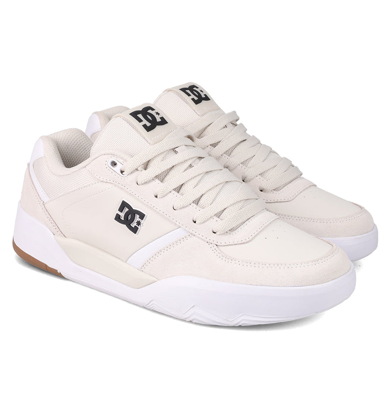 Men's Fractal Shoes by DC Shoes in off-white feature white midsoles, tan outsoles, mesh accents, and DC logos on the side and tongue. These low-tops offer performance comfort and street-ready style.