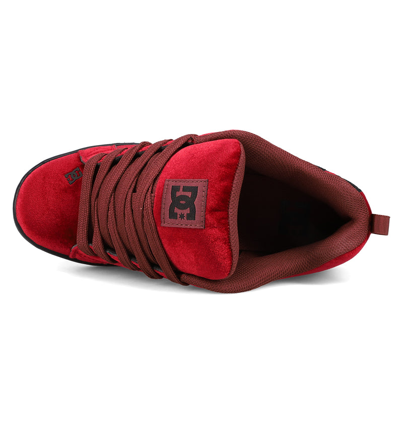 A top view of the Women's Court Graffik LE Shoes by DC Shoes, showing thick red laces, a padded tongue with the DC logo, and a puffy silhouette crafted from premium upper materials.