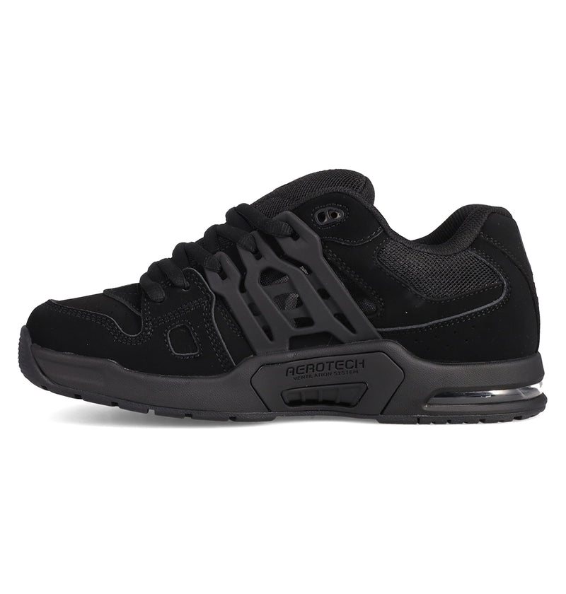The DC Shoes Men's AT-2 features black mesh and suede-like materials, thick laces, a textured airband outsole, AEROTECH branding on the midsole, and an AEROTECH ventilation system for breathability.