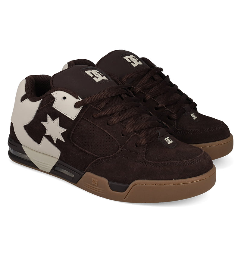 The Men's DC Command SE Shoes by DC Shoes feature dark brown suede, gum soles, brown laces, white logo accents on the sides and tongue, and signature cushioning for all-day comfort.