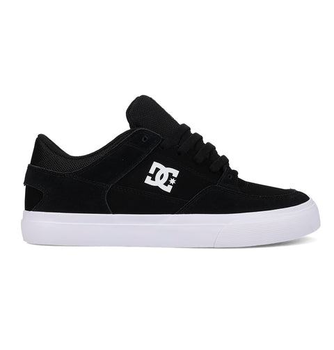 The DC Shoes Men's Onyx Shoes feature a black upper with a white DC logo, black laces, and a thick white rubber sole. This minimal vulc silhouette is shown in side profile on a white background—perfect for everyday wear.