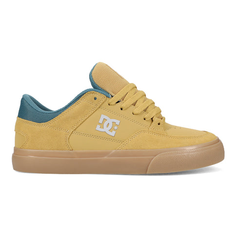 The Men's Onyx S Shoes by DC Shoes feature a yellow and teal design with a gum sole, yellow laces, white side logo, suede and mesh upper, minimal silhouette, and teal padding on the heel and tongue.