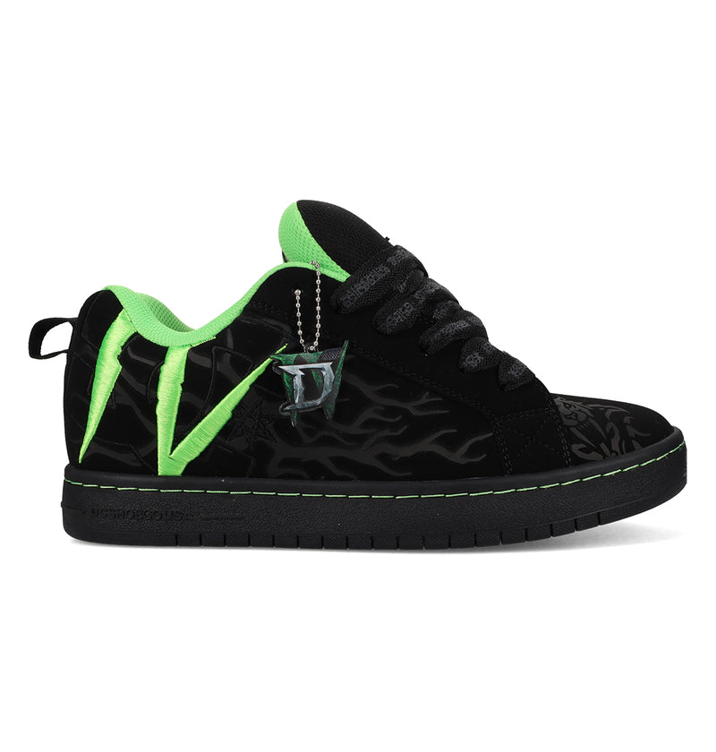 The Men’s Court Graffik x Diablo by DC Shoes is a black sneaker with neon green accents, flame patterns, thick black laces, and a silver drink cup keychain. It features a low profile and flat sole.