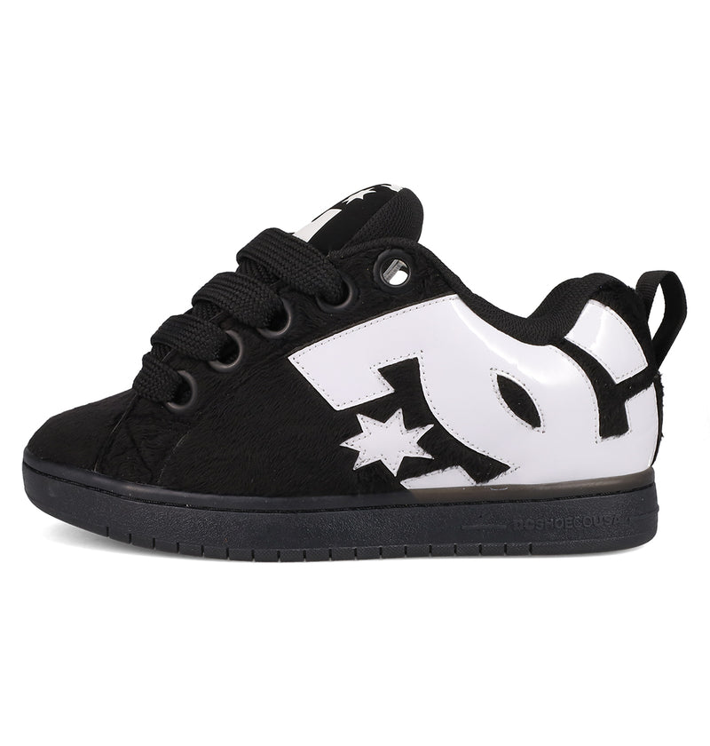 The Men's Court Graffik Puff Shoes by DC Shoes feature a puffy black silhouette, thick black laces, a bold white DC logo with star on the side, an exaggerated upper, and a black sole. Photographed on a plain white background.