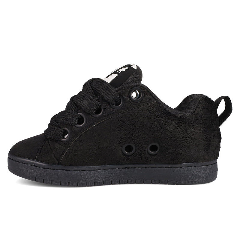 The Men's Court Graffik Puff Shoes by DC Shoes are black low-top sneakers featuring an exaggerated upper, thick laces, textured side, ventilation holes, a pull tab at the back, and a black sole.