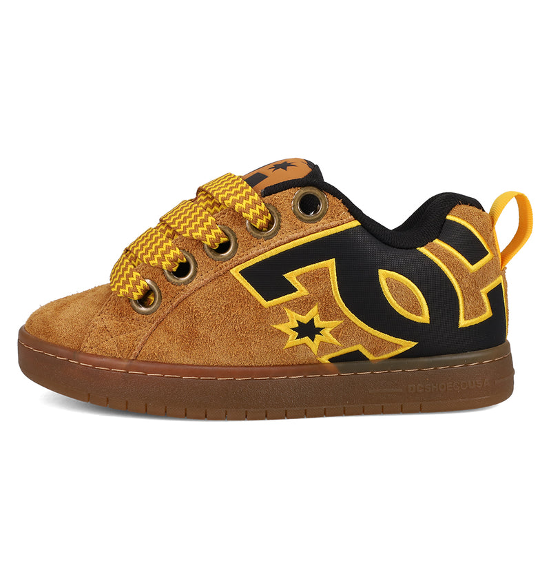 The DC Shoes Men's Court Graffik Puff Shoes feature a brown and black suede upper, bold graphics, yellow zigzag laces, a yellow pull tab, gum sole, DC logo details in yellow and black, and an exaggerated puffy silhouette.