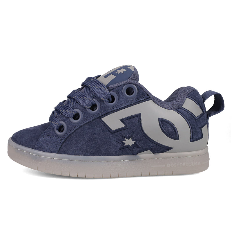The DC Shoes Men's Court Graffik features a puffy navy blue suede design, thick sole, large light gray DC logo on the side, and matching navy laces.