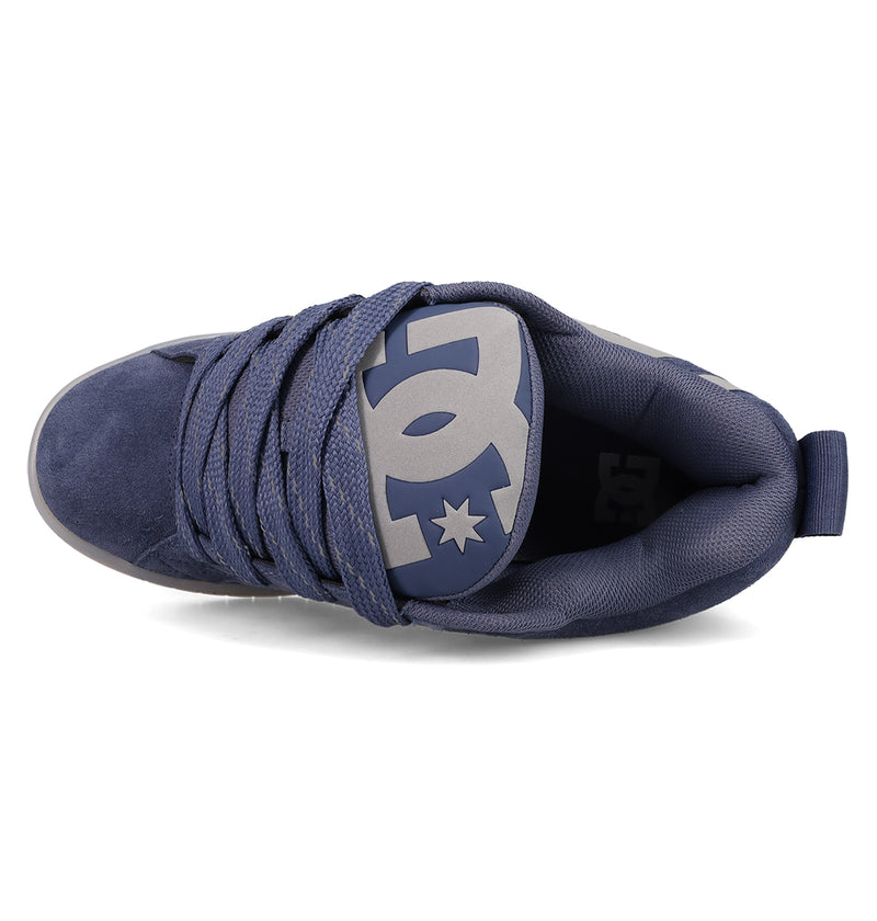 Top view of the Men's Court Graffik Shoes by DC Shoes in navy blue, featuring wide laces, a padded tongue with a gray DC logo, and the classic puffy silhouette.