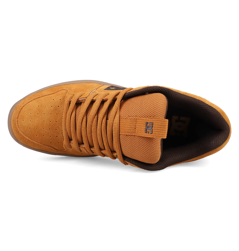 Top view of the Men's Lynx Zero SE Shoes by DC Shoes in brown suede, featuring matching laces, a perforated toe box, padded tongue with DC logo, and dark brown inner lining.