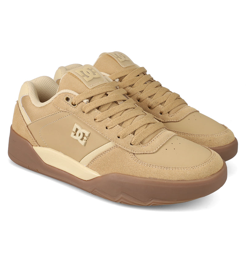 The Men's Fractal S Shoes by DC Shoes feature a tan and beige design with brown soles and the DC logo on the side and tongue, showcased against a white background for street-ready style.