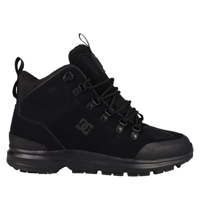 The Men’s DC Tarmont Shoes by DC Shoes are black mid-top hiking boots with metal eyelets, a chunky sole, and the signature DC logo on the side—blending street-ready style with outdoor performance and shown here from the left view.