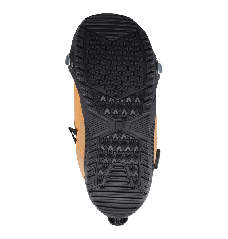 Bottom view of tan Men’s DC Quantum Step On® Snowboard Boots, featuring a black, multi-patterned rubber lug sole.