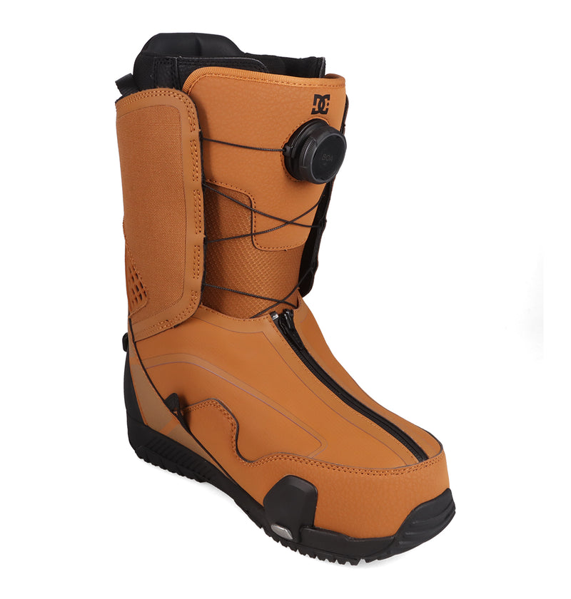Tan Men’s DC Quantum Step On® Snowboard Boots featuring a central zipper, a black BOA Fit System dial on the upper side, and a thick black sole.