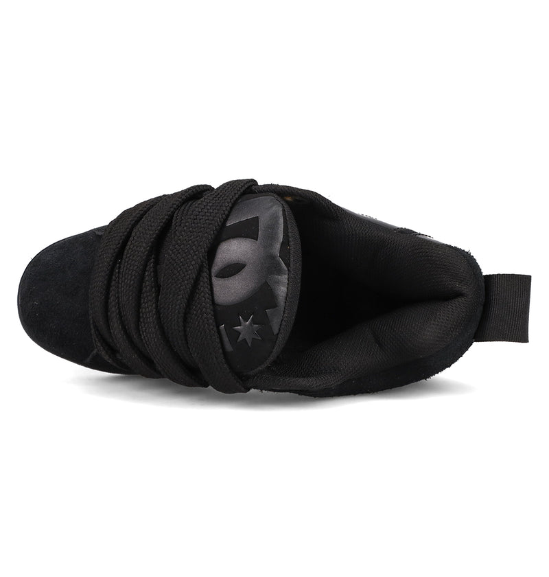 Top view of the DC Shoes Women's Court Graffik Puff, a black sneaker with thick laces, padded tongue showing part of the gray DC logo, puffy silhouette, and a heel pull tab for easy wear.