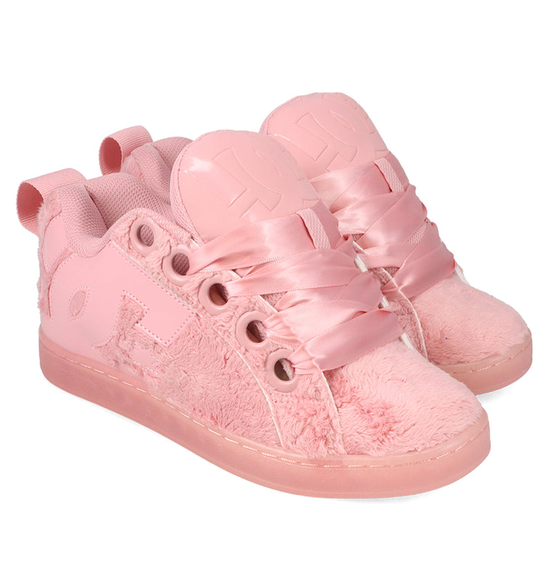 The Women’s Court Graffik Puff Shoes by DC Shoes feature a playful and stylish puffy silhouette inspired by the original Court Graffik Puff design. These pink fuzzy fashion sneakers are adorned with satin ribbon laces, thick soles, and heart-shaped tongue details, along with extra eyelets and back pull tabs for added flair.
