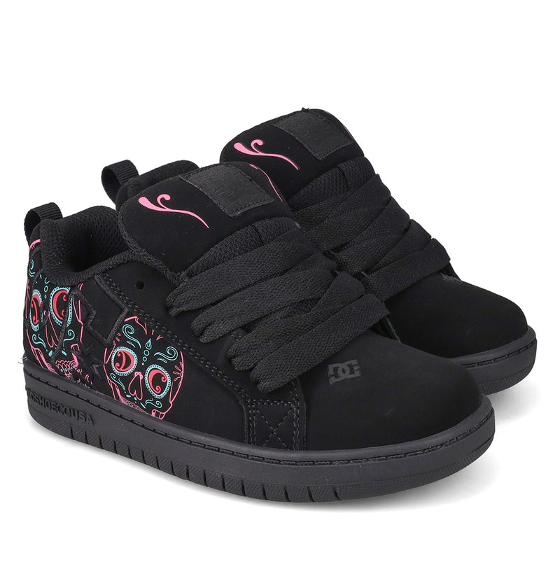 Step out in style with the Kids’ Court Graffik Day Of The Dead sneakers by DC Shoes—black kicks featuring thick black laces, vibrant sugar skull and floral artwork along the sides, plus lively pink accents on the tongue and upper. Part of DC Shoes’ Day of the Dead Collection, these shoes are a festive tribute to Día de los Muertos with their eye-catching details.