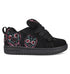 The DC Shoes Kids’ Court Graffik Day Of The Dead is a low-top black skate shoe with black laces, highlighted by vibrant neon skull designs inspired by Día de los Muertos on the sides and back. It features a black sole and DC Shoes branding on the side and tongue.