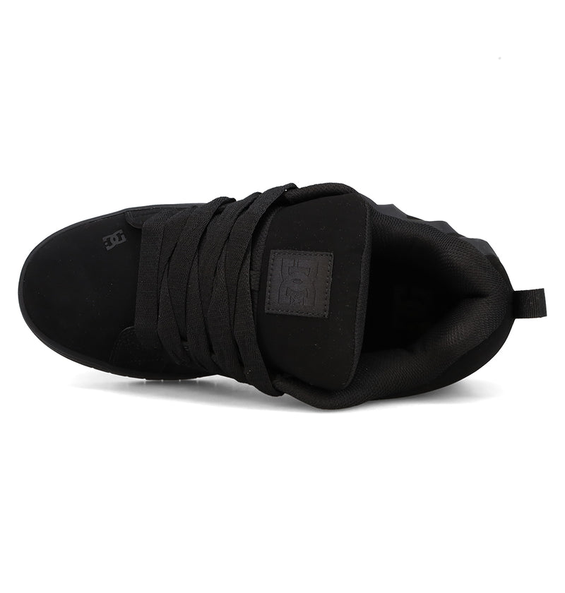 Top view of the DC Shoes Men’s Court Graffik Beveled Shoes in black, featuring thick laces, a padded collar, and a heel pull tab. The tongue and side showcase subtle embossed DC branding, while the shoe’s puffy silhouette and suede-like finish pay homage to the iconic Court Graffik Beveled style.