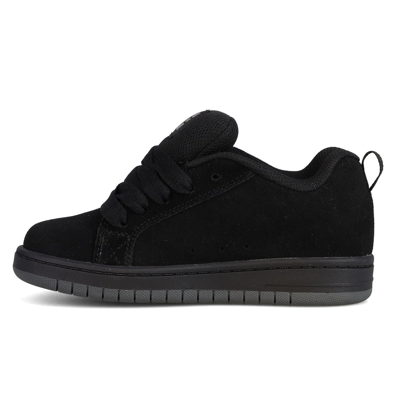 A black skate-style sneaker—shown in profile on a white background—features thick laces, a padded tongue, a black rubber sole, bold DC Shoes branding, and the distinctive puffy silhouette of the Kids’ Court Graffik Beveled Special Edition Shoes.