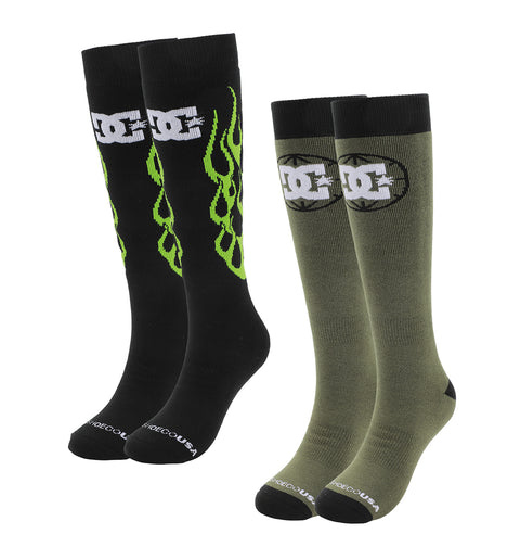 The DC Shoes Performance Socks 2-Pack includes one pair of black knee-high socks with neon green flames and a white DC logo, and one olive green pair with a bold black and white DC logo. Both feature black cuffs, heels, and toes.