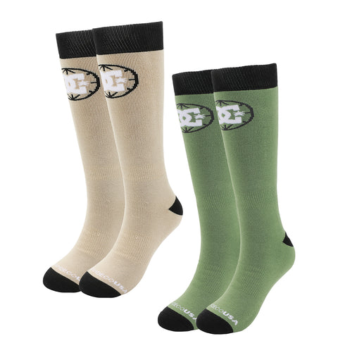 The DC Shoes Performance Socks 2-Pack includes beige and green knee-high socks, each with black toes, heels, cuffs, and a black-and-white star logo on the upper sides.