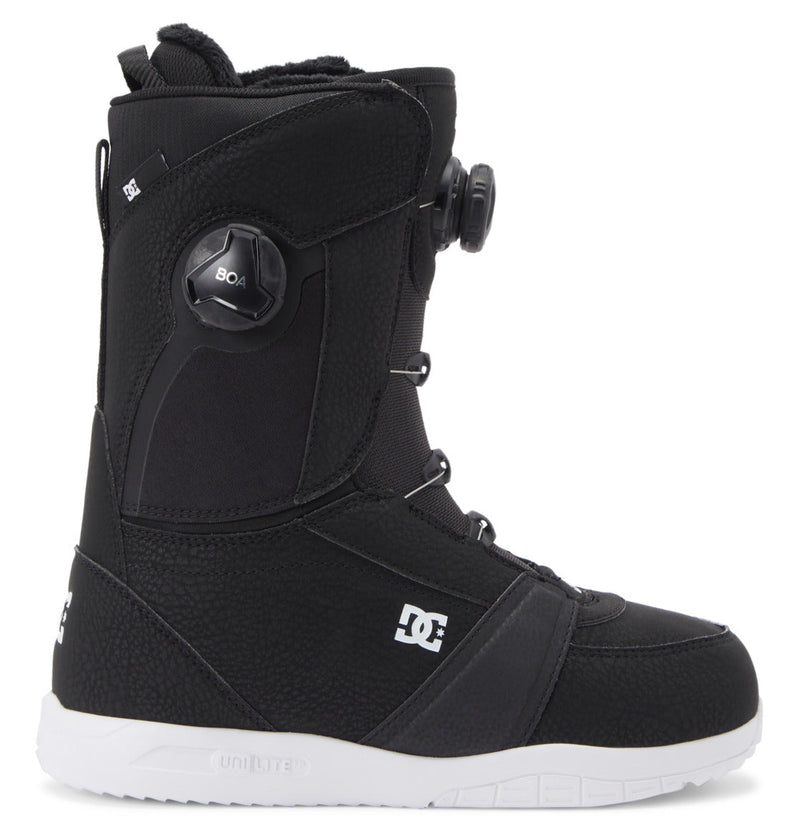The DC Shoes Women's Lotus BOA® Snowboard Boots are black with a white UNILITE outsole, side BOA dial lacing system, and DC logo on the side, shown in profile facing right against a white background.