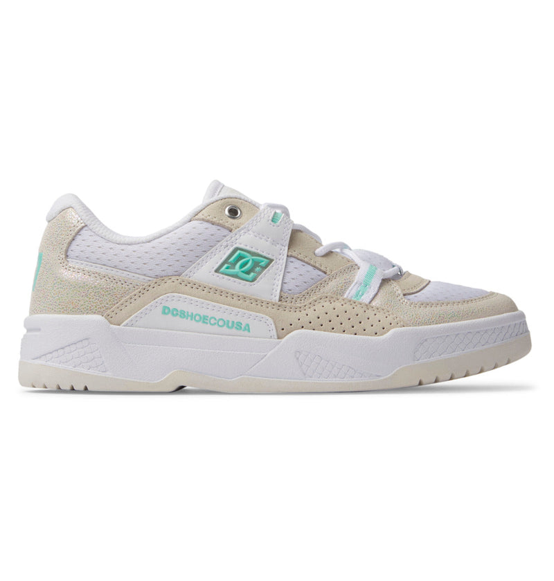 The Women's Construct Shoes by DC Shoes are low-top sneakers for women in white and beige with teal accents. They feature mesh, suede, and leather panels, perforated details, DCSHOECOUSA branding, and a textured off-white sole.