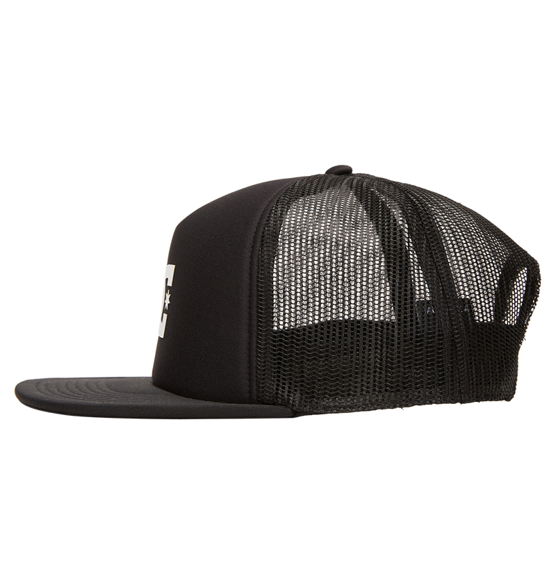 The Men's Gas Station Trucker Hat by DC Shoes features black mesh panels, a flat brim, a partial white logo on the front, and an adjustable fit for all-day comfort. Shown in a side view on a white background.