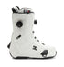 Introducing the Men’s Control Step On® Snowboard Boots by DC Shoes: These white boots feature black accents, a textured sole, and a side dial tightening system. Showcasing advanced snow boot technology, they come equipped with the Dual Zone BOA Fit System for customizable comfort and security. The signature DC Shoes logo appears near the ankle.