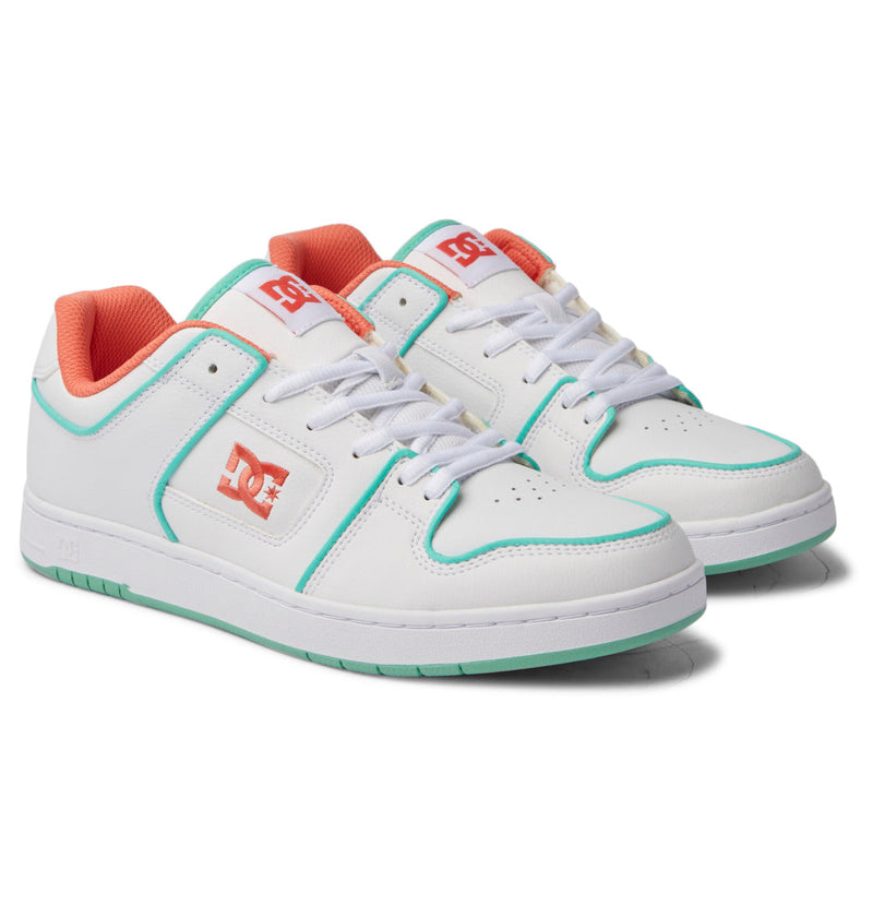 The Men's Manteca 4 SE Shoes by DC Shoes are white low-tops with teal trim, light teal soles, orange inner lining, and white laces. The DC logo accents the side and tongue, giving these shoes a classic skate-inspired performance style.