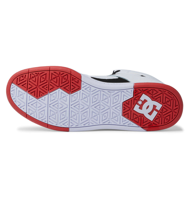 A close-up of the sole of the Men's DC Cure High-Top Shoes by DC Shoes, featuring a red and white logo near the heel, geometric tread pattern, and red detailing on the toe and heel.