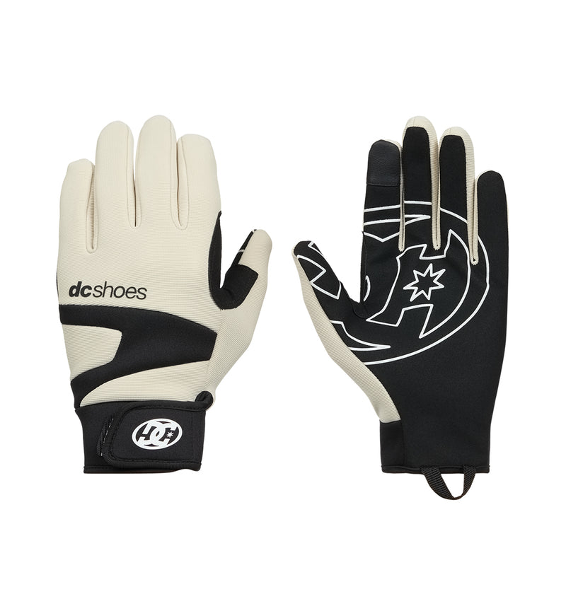 A pair of DC Shoes Trackstar Park Gloves, displayed with one palm up and one palm down. These gloves feature a black and beige color scheme with DC Shoes logos on the wrist and back of the hand. Designed with insulated warmth, they keep your hands comfortable in cold conditions.