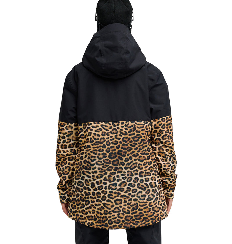 A person shown from the back wearing the DC Shoes Cruiser Jacket, an insulated hooded jacket featuring a black top half and a leopard print bottom half.