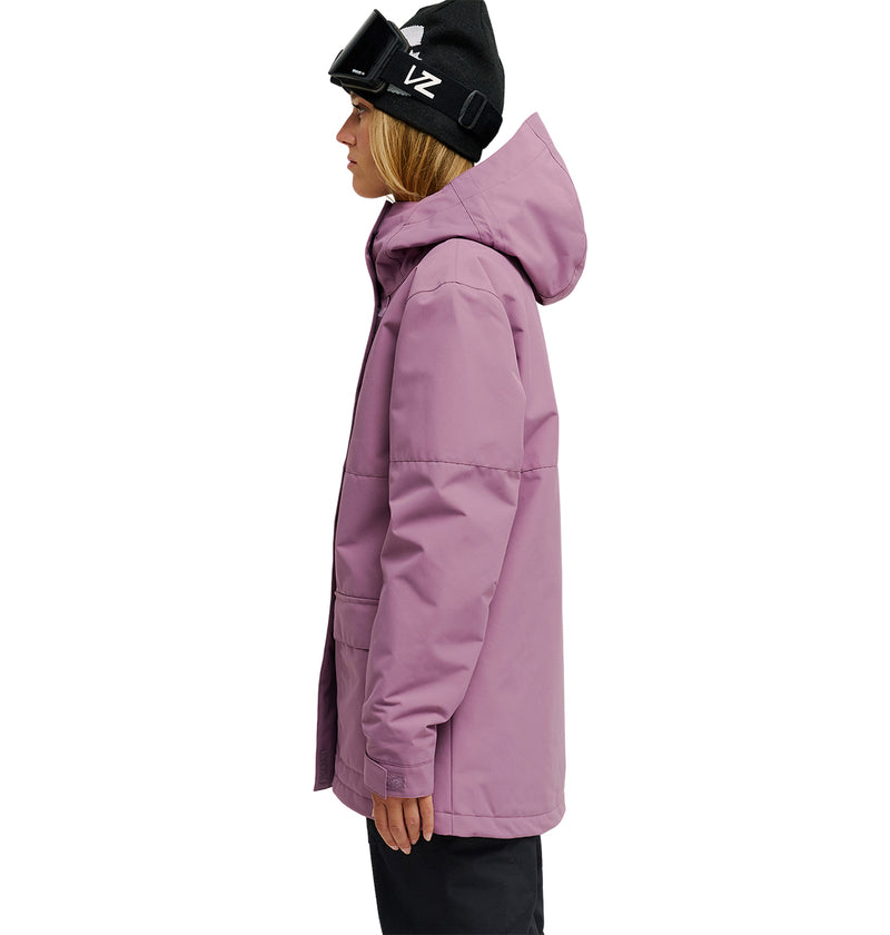 A person in a DC Shoes Cruiser Jacket, which is violet and insulated with a hood, along with black ski goggles and a black beanie, stands in profile against a white background.